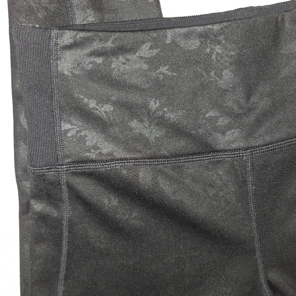 Athleta black floral print leggings with ankle keyhole small - Picture 4 of 9